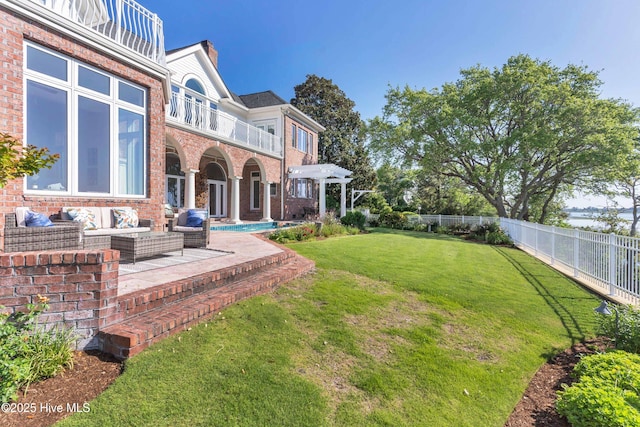 view of yard featuring an outdoor hangout area, a patio, and a fenced backyard