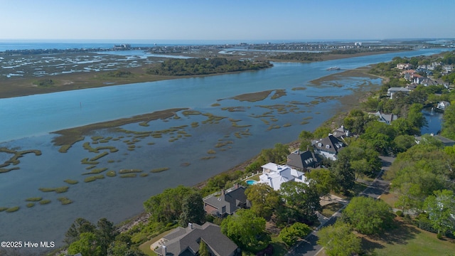 bird's eye view with a water view and a residential view