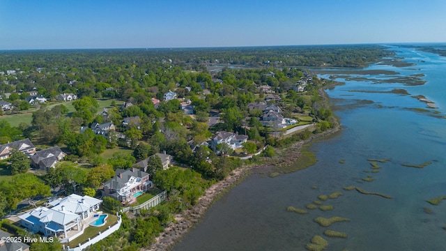 aerial view featuring a water view, a forest view, and a residential view