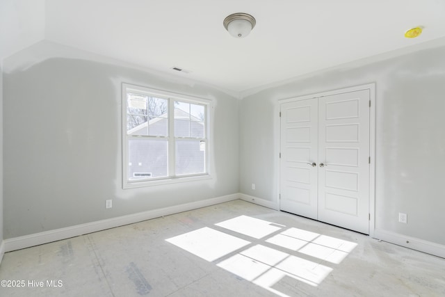 unfurnished bedroom featuring a closet