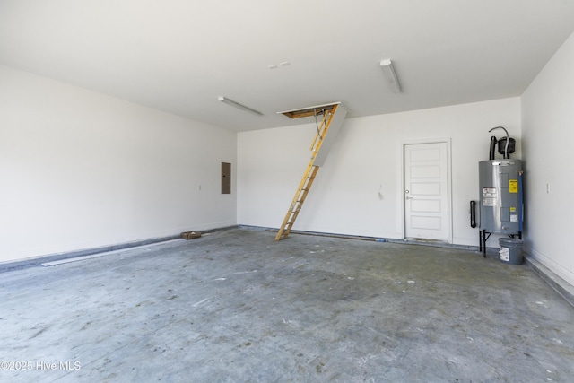 garage with electric panel and electric water heater