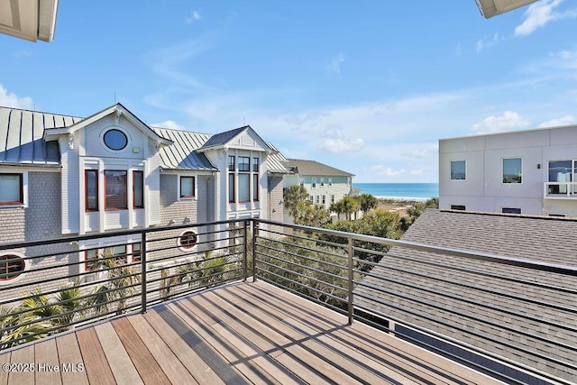 wooden terrace with a water view