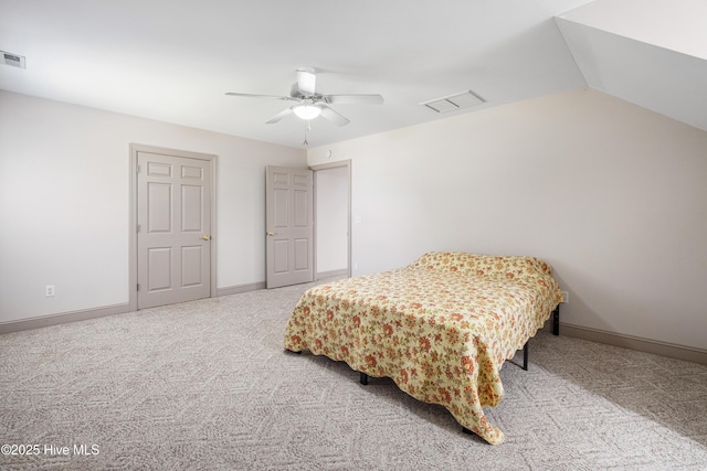 bedroom featuring vaulted ceiling, ceiling fan, and carpet