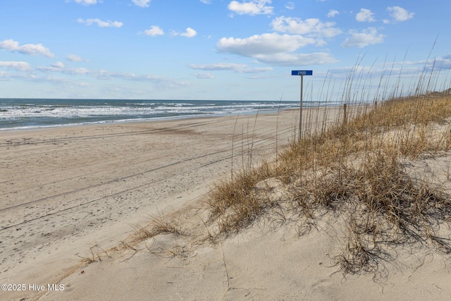 property view of water with a beach view