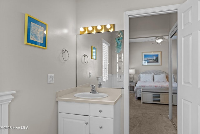 bathroom with vanity and ceiling fan