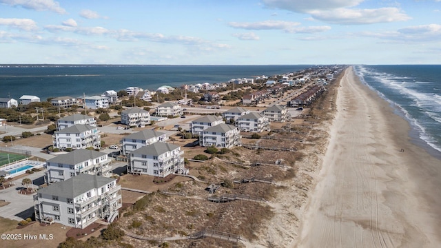 aerial view featuring a water view and a view of the beach