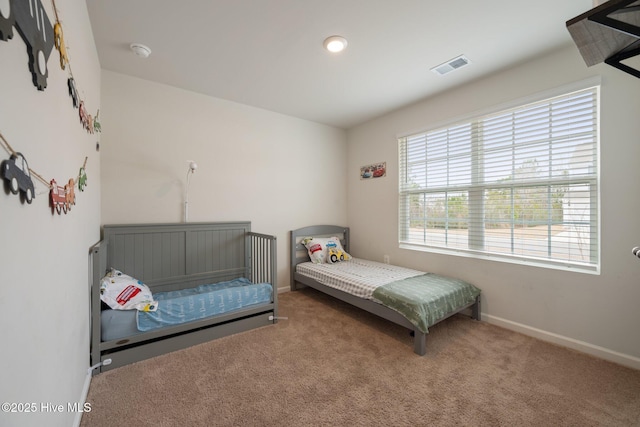 bedroom featuring carpet flooring