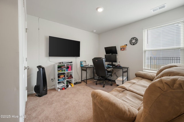 home office featuring light carpet