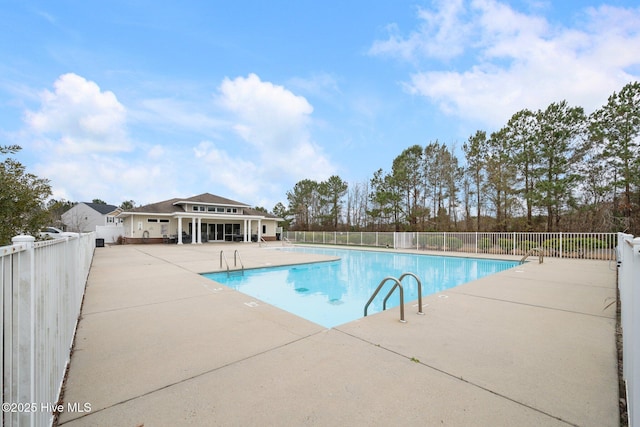 view of pool featuring a patio area