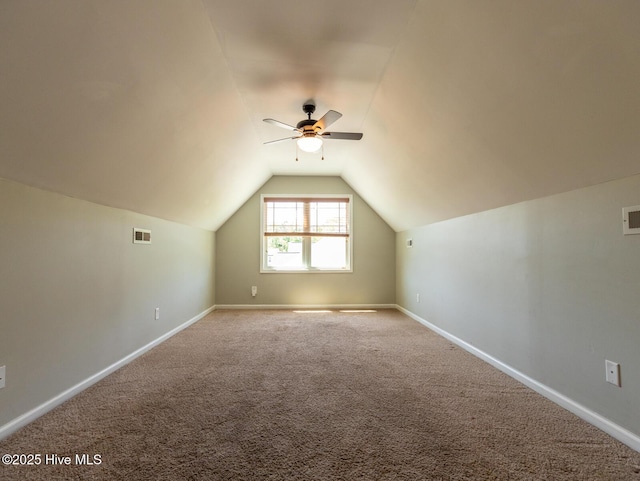 600 Feather Ct, Richlands, NC 28574 - bonus room with carpet flooring, ceiling fan, baseboards, lofted ceiling, and visible vents