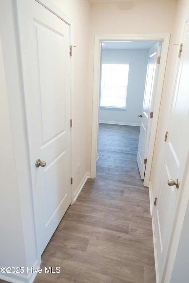 corridor featuring light hardwood / wood-style flooring