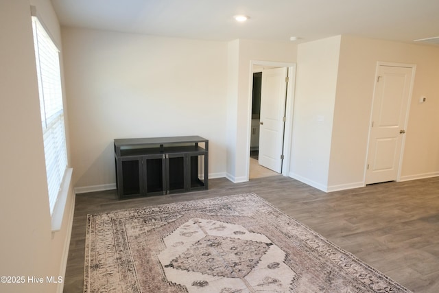 unfurnished room featuring wood-type flooring