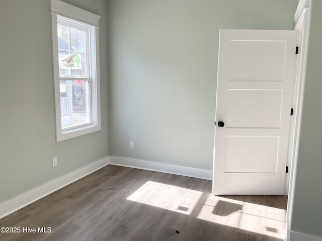 spare room featuring light hardwood / wood-style floors