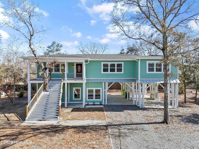 view of front facade featuring a carport and covered porch