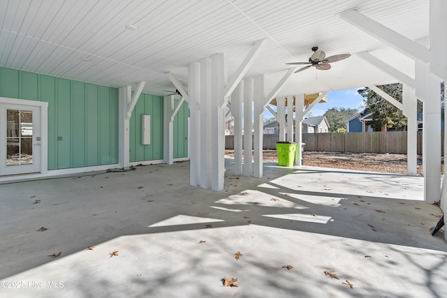 view of patio / terrace featuring electric panel and ceiling fan