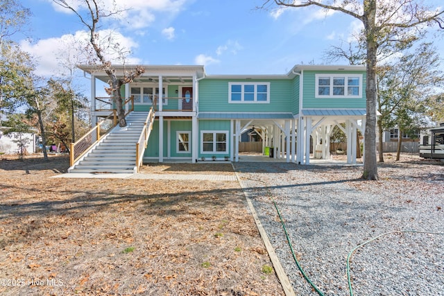 view of front of home with a carport