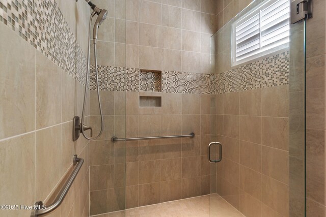 bathroom featuring walk in shower