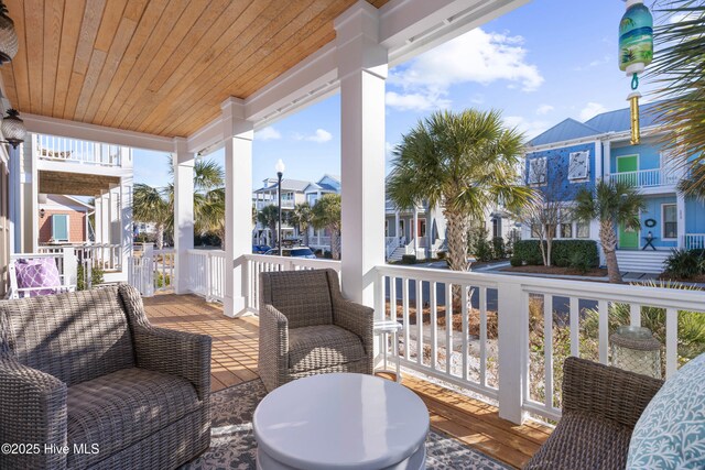 wooden terrace with covered porch