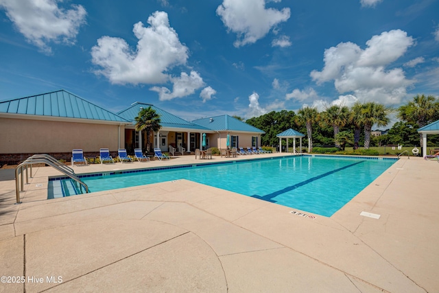 pool featuring a patio area and a gazebo