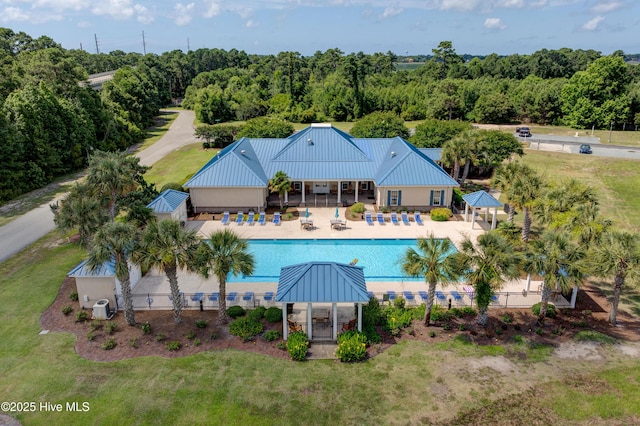 pool featuring a patio area, fence, and a gazebo