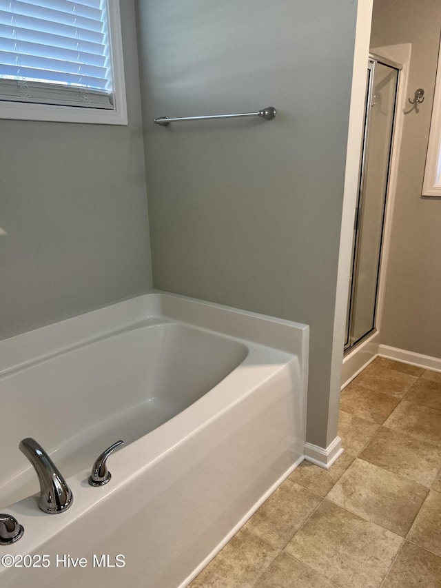 bathroom with independent shower and bath