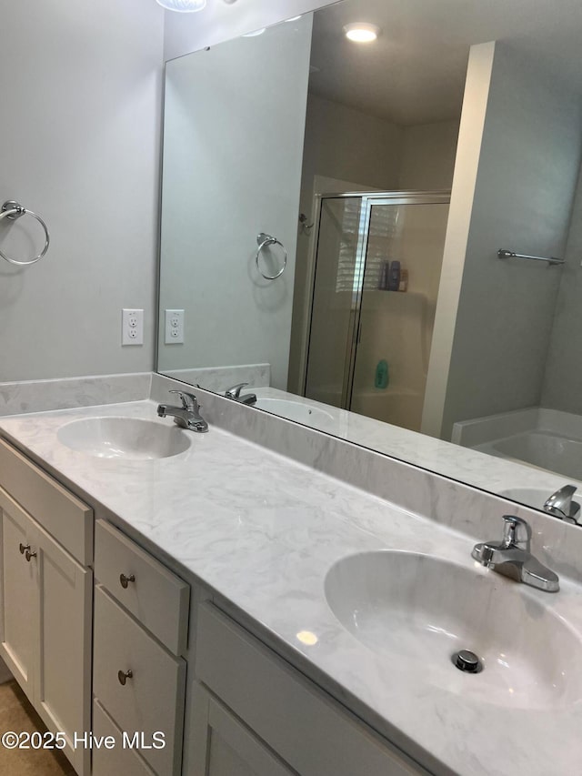 bathroom featuring tile patterned flooring, vanity, and separate shower and tub