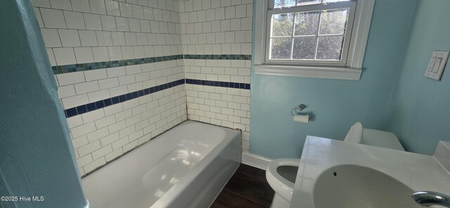 empty room with crown molding and dark hardwood / wood-style flooring