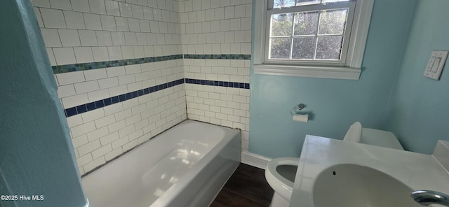 bathroom with sink, wood-type flooring, and toilet