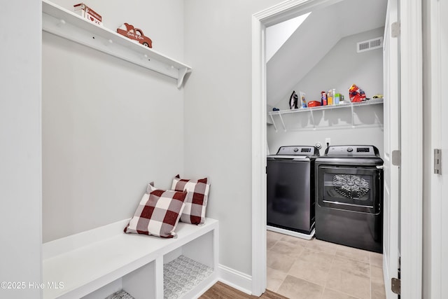 washroom with washer and clothes dryer