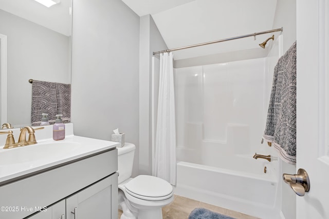 full bathroom with vanity, shower / tub combo with curtain, tile patterned floors, and toilet