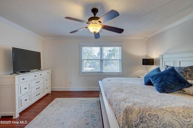 bedroom featuring crown molding, dark wood-type flooring, ceiling fan, and a textured ceiling