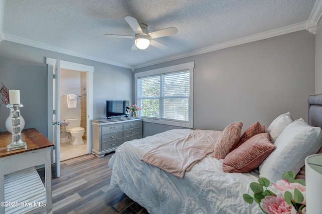 bedroom featuring light hardwood / wood-style flooring, ceiling fan, ensuite bathroom, ornamental molding, and a textured ceiling