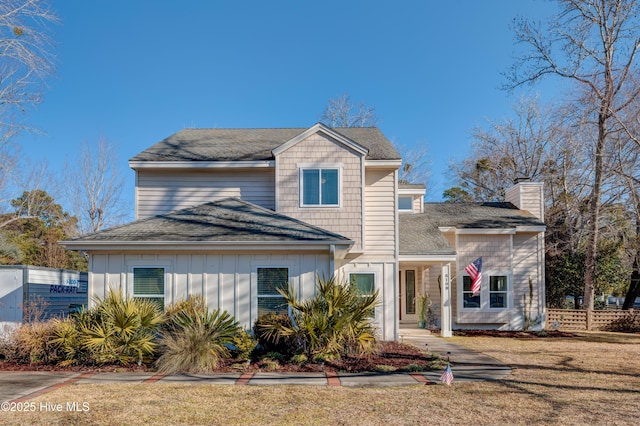 front facade featuring a front lawn