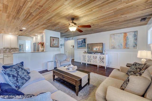 living room with hardwood / wood-style floors, wooden ceiling, and ceiling fan