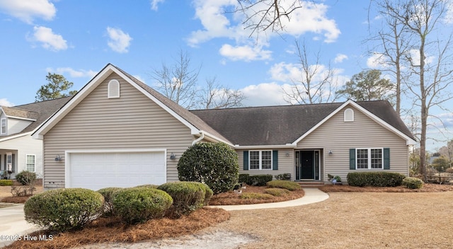 ranch-style home with a garage