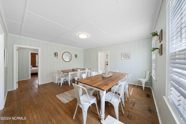 dining area with dark wood-type flooring