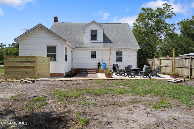 rear view of property with a patio