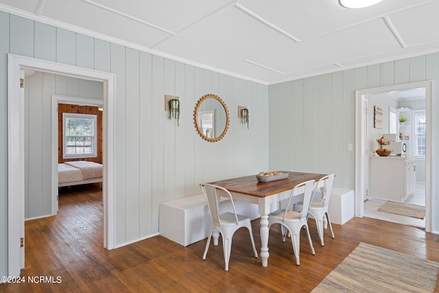 dining room with dark hardwood / wood-style flooring and breakfast area