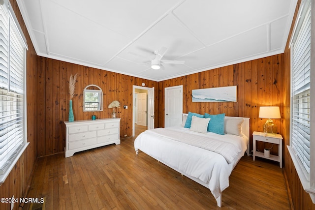 bedroom featuring hardwood / wood-style flooring and ceiling fan