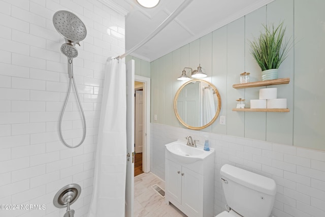 bathroom with vanity, crown molding, toilet, and a shower with shower curtain