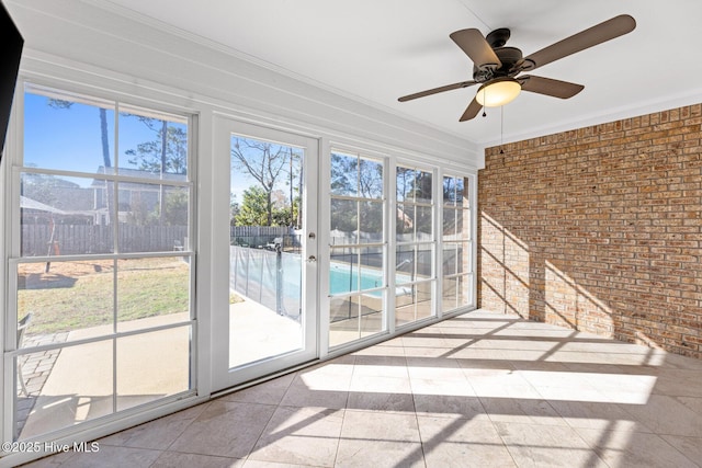 unfurnished sunroom with a wealth of natural light