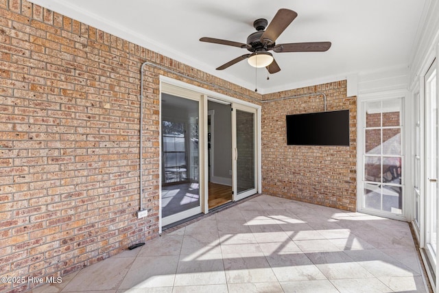 view of patio with ceiling fan