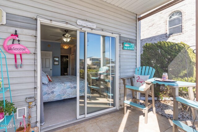 sunroom with a water view and a healthy amount of sunlight