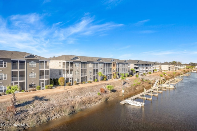 view of property with a water view