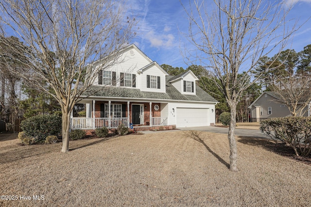 cape cod home featuring a porch and a garage