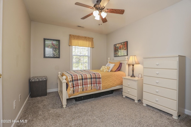 bedroom with carpet, visible vents, baseboards, and a ceiling fan