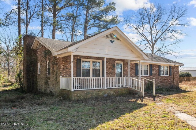 view of home's exterior with a porch