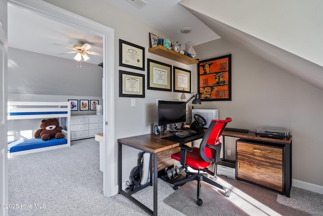 home office featuring ceiling fan, lofted ceiling, and carpet flooring