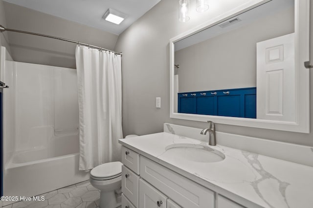 full bathroom with shower / bath combination with curtain, tile patterned floors, toilet, and vanity