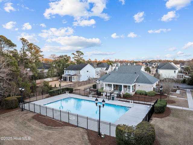 view of swimming pool with a patio area